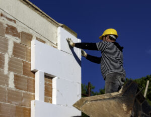 Construction site - Installing external insulation Facade therm